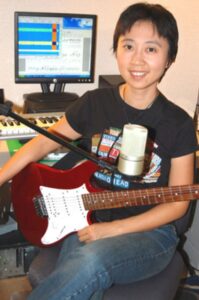 Ching-Hua Chuan with guitar