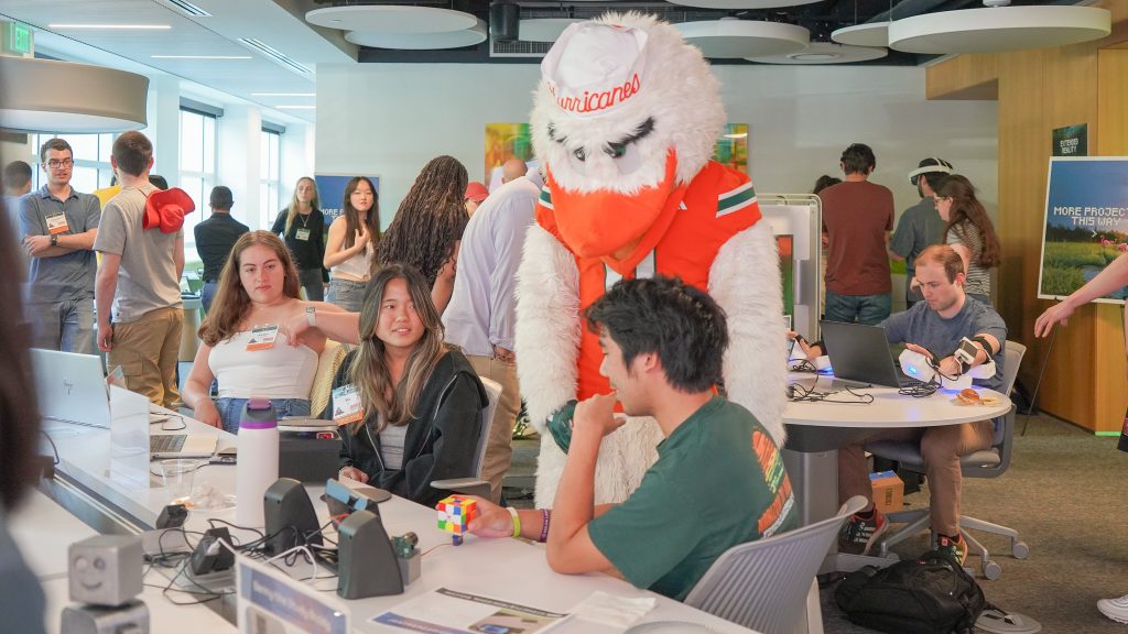 University of Miami mascot Sebastian the Ibis drops by the School of Communication Department of Interactive Media End of Year Show to admire the students' projects
