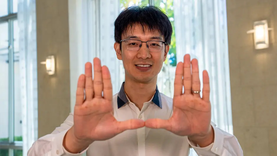 Wanli Xing (NEWS@TheU Story) photo by Matthew Rembold